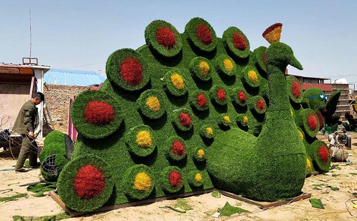 洛陽孔雀開屏仿真綠雕-仿真綠雕工藝品的制作方法